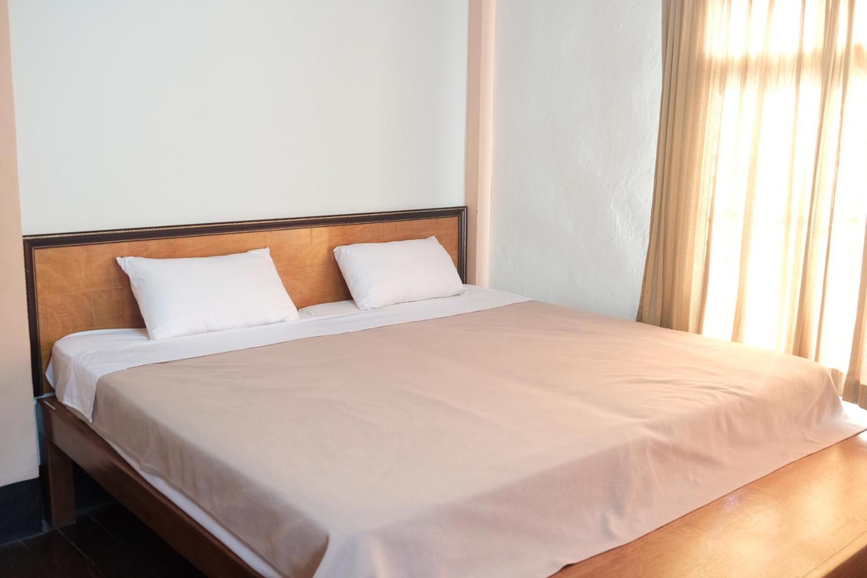 Manilath Guesthouse Хуайсай Номер фото